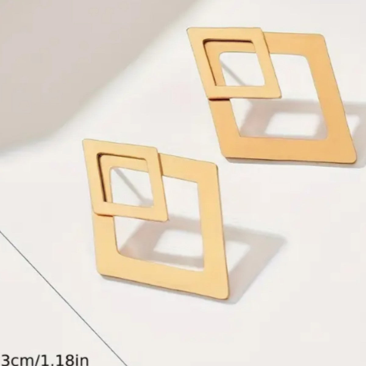 Levi Rhei Geometric Glow Earrings