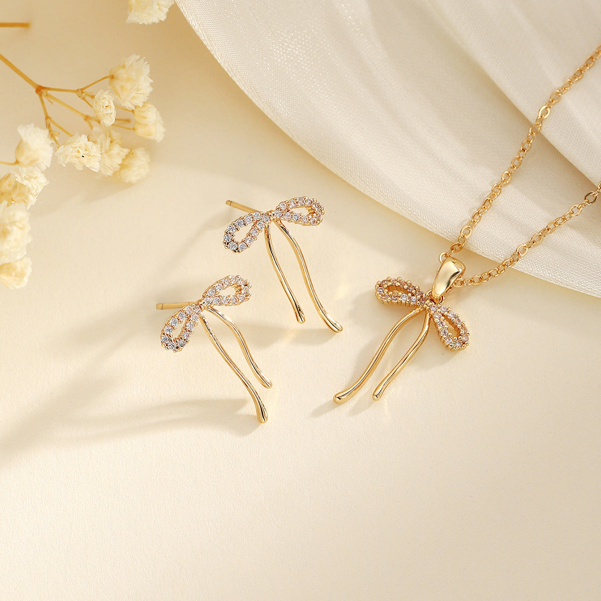 Levi Rhei Bow Charm Jewelry Set
