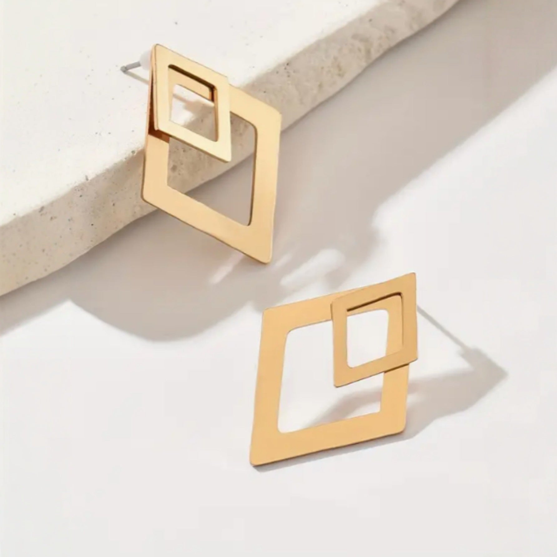Levi Rhei Geometric Glow Earrings