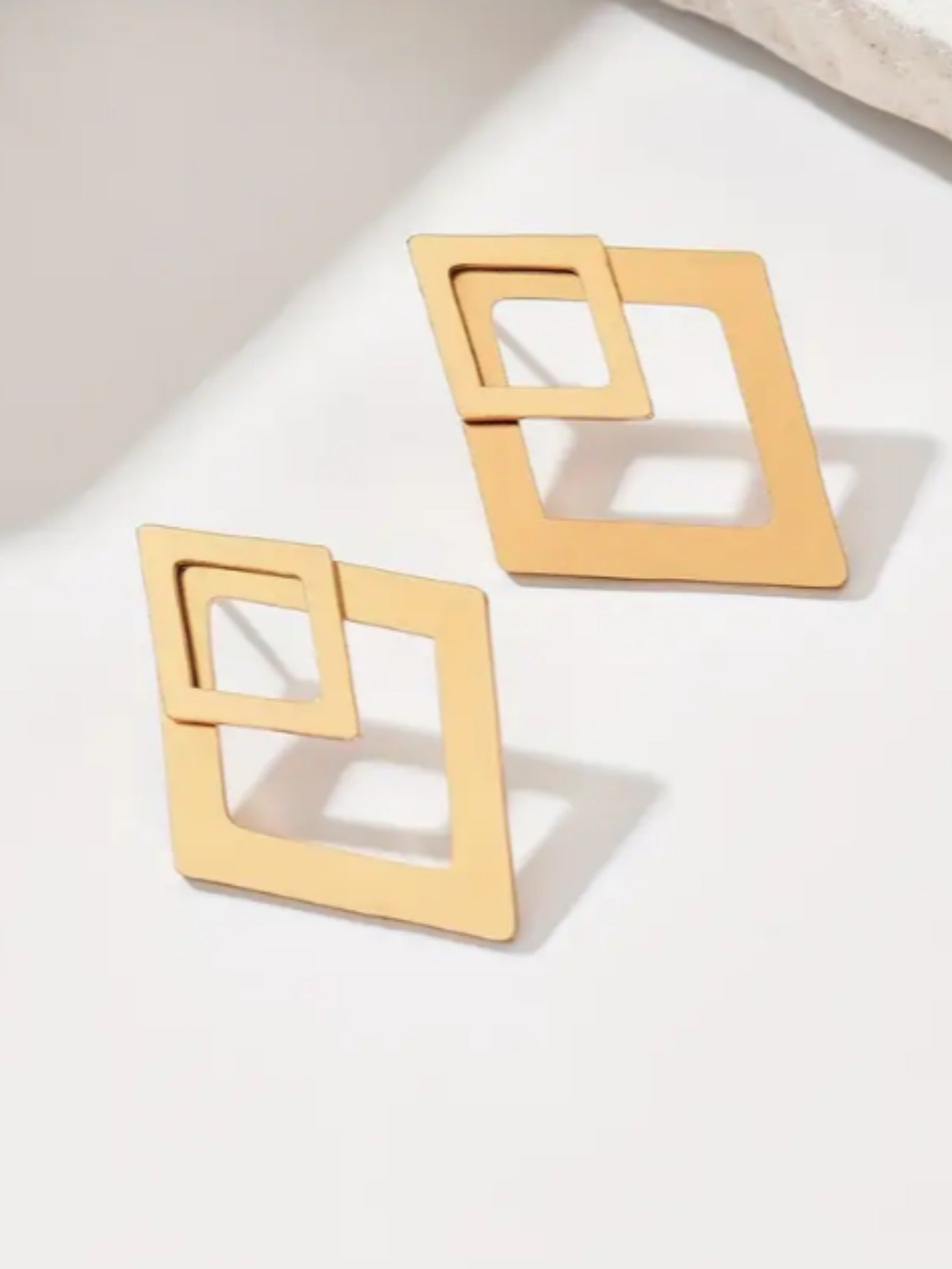 Levi Rhei Geometric Glow Earrings