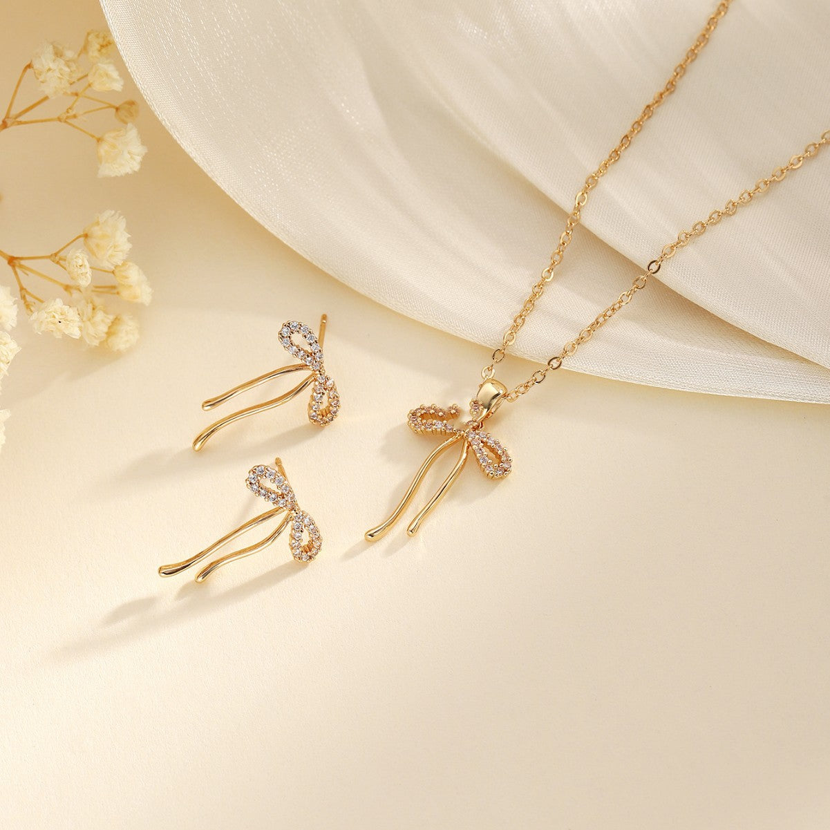 Levi Rhei Bow Charm Jewelry Set